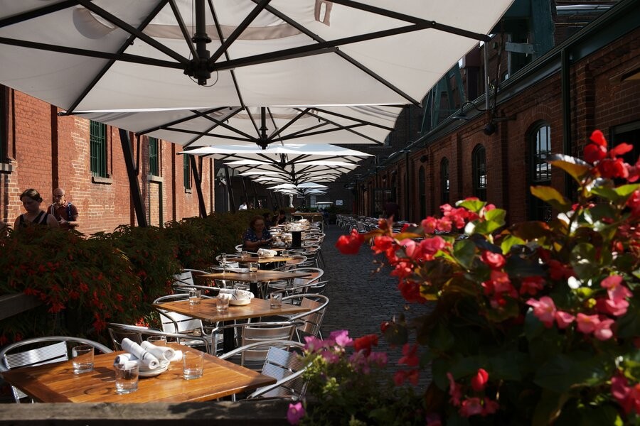 A restaurant’s outdoor dining area benefiting from upgraded outdoor entertainment.